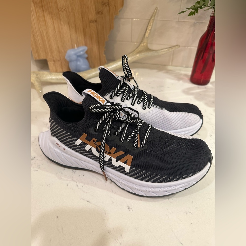 Hoka Women's Black White and Gold Athletic Running Shoes